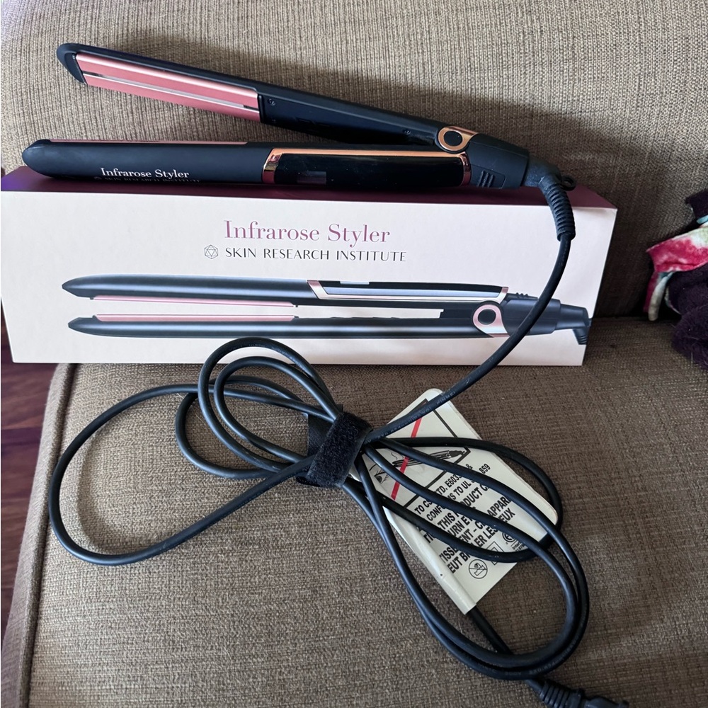 Infarose Styler Flat Iron. Only used a few times. Paid $200 for it.